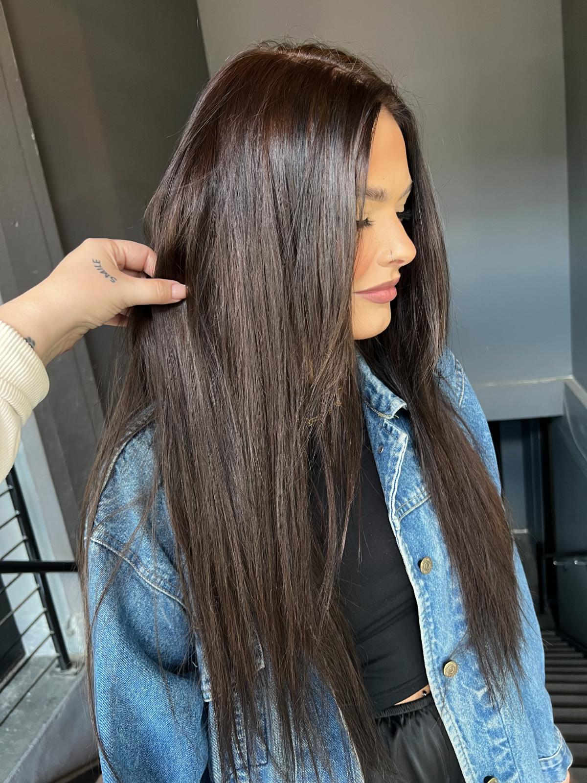 Model posing showing hair color and style by Parella