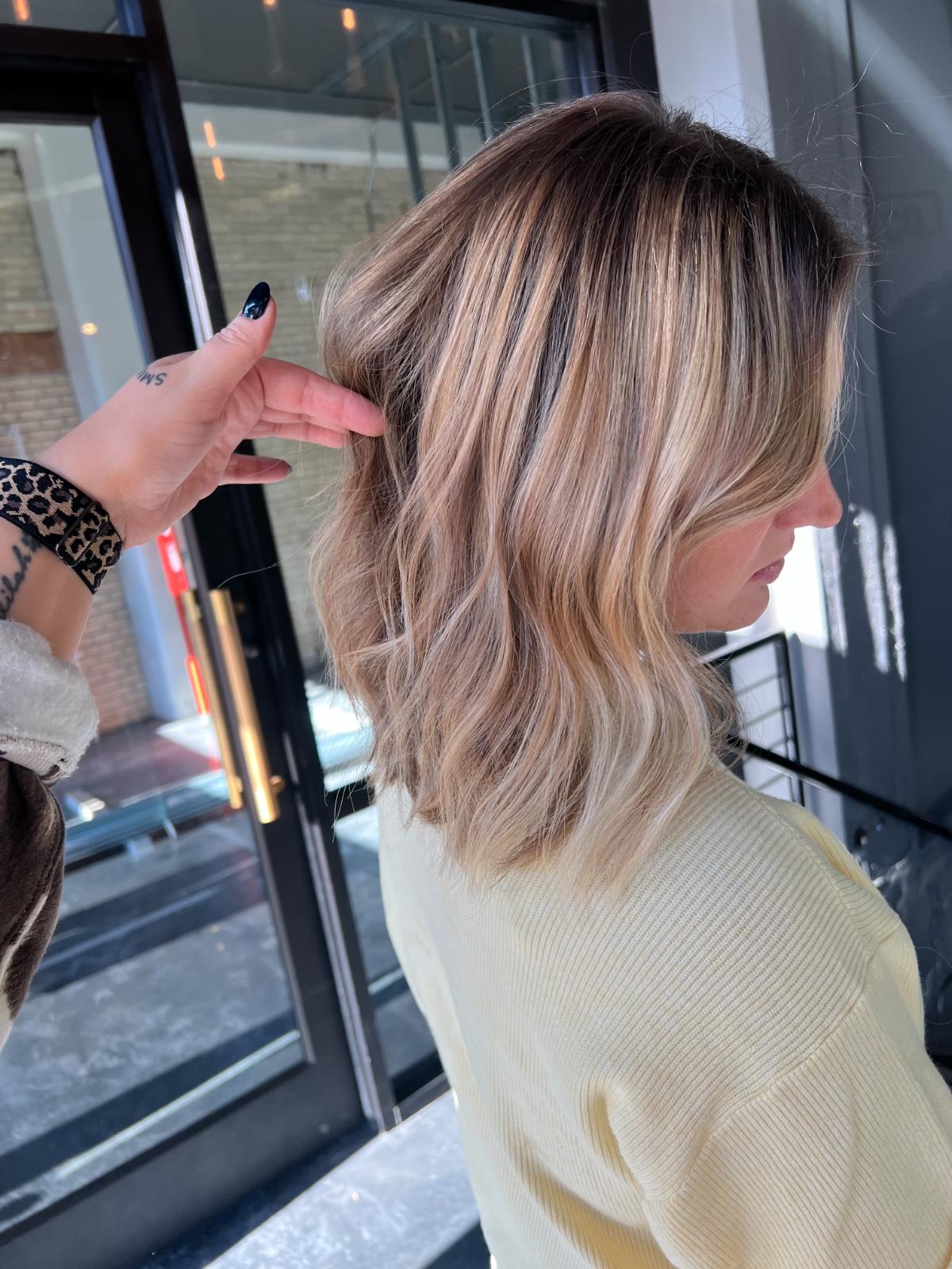 Model posing showing haircut, color, and style by Parella